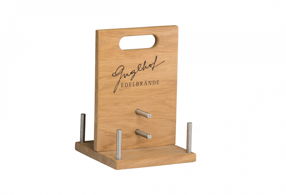 Bottle carrier for noble brandies made of solid wood with stainless steel holder